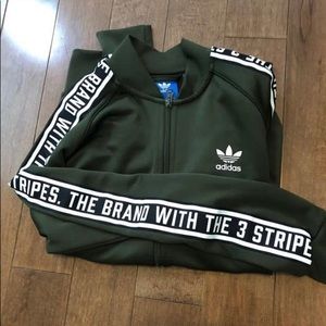 The brand with 3 stripes zip up sweatshirt.